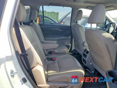 Zdjęcie 10 z 12 samochodu: 2021 HONDA PILOT TOURING VIN:5FNYF6H65MB054575 - miniatura