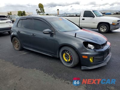 Czwarte zdjęcie samochodu z boku: 2013 VOLKSWAGEN GTI VIN:WVWHV7AJXDW130004 - miniatura