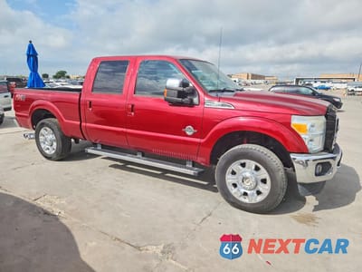 Czwarte zdjęcie samochodu z boku: 2014 FORD F250 SUPER DUTY VIN:1FT7W2BT5EEB40488 - miniatura