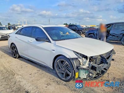 Czwarte zdjęcie samochodu z boku: 2022 HYUNDAI ELANTRA N LINE VIN:KMHLR4AF9NU311709 - miniatura