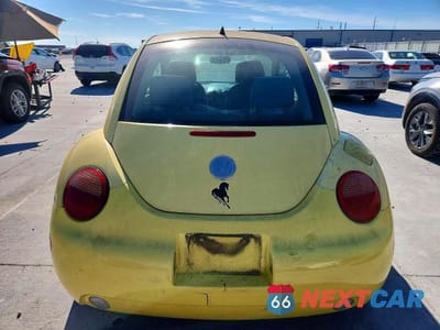 Zdjęcie 6 z 12 samochodu: 2004 VOLKSWAGEN NEW BEETLE GL TDI VIN:3VWBR31CX4M416467 - miniatura