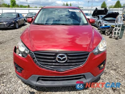 Piąte zdjęcie samochodu w środku: 2016 MAZDA CX-5 TOURING VIN:JM3KE2CY4G0912414 - miniatura
