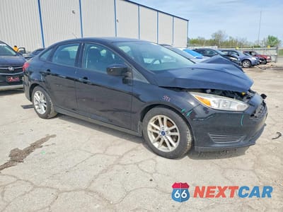 Czwarte zdjęcie samochodu z boku: 2018 FORD FOCUS SE VIN:1FADP3F27JL236948 - miniatura