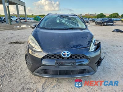 Piąte zdjęcie samochodu w środku: 2018 TOYOTA PRIUS C TWO VIN:JTDKDTB32J1617370 - miniatura