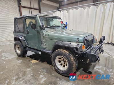 Czwarte zdjęcie samochodu z boku: 2000 JEEP WRANGLER / TJ SPORT VIN:1J4FA49SXYP712676 - miniatura
