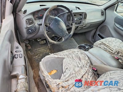 Zdjęcie 8 z 12 samochodu: 1999 FORD F150 VIN:2FTRX18LXXCA12327 - miniatura