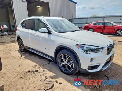 Czwarte zdjęcie samochodu z boku: 2017 BMW X1 XDRIVE28I VIN:WBXHT3C34H5F70119 - miniatura