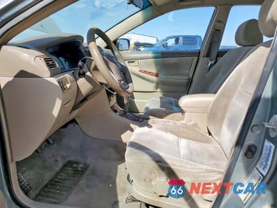 Zdjęcie 7 z 11 samochodu: 2004 TOYOTA COROLLA LE VIN:1NXBR32E14Z331110 - miniatura