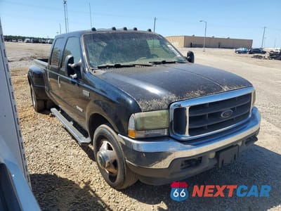 Czwarte zdjęcie samochodu z boku: 2004 FORD F350 SUPER DUTY VIN:1FTWW32P24EA30419 - miniatura