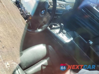 Zdjęcie 8 z 12 samochodu: 2014 BMW 750 LI VIN:WBAYE8C53ED134587 - miniatura