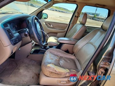 Zdjęcie 7 z 12 samochodu: 2002 MAZDA TRIBUTE LX VIN:4F2YU08142KM07136 - miniatura