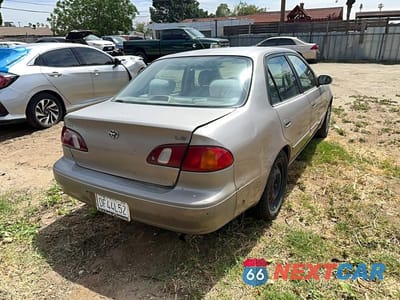Czwarte zdjęcie samochodu z boku: 1998 TOYOTA COROLLA VE VIN:1NXBR18E9WZ085034 - miniatura