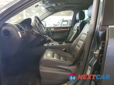 Zdjęcie 7 z 13 samochodu: 2006 VOLKSWAGEN TOUAREG 3.2 VIN:WVGZG77L96D038433 - miniatura