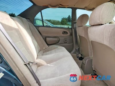Zdjęcie 10 z 12 samochodu: 1997 TOYOTA COROLLA DX VIN:1NXBB02E5VZ588419 - miniatura