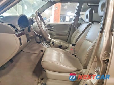 Zdjęcie 7 z 13 samochodu: 2003 SUZUKI XL7 PLUS VIN:JS3TX92V334104938 - miniatura