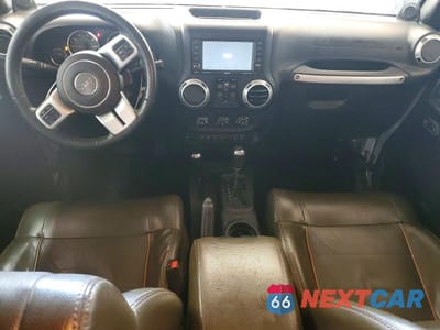 Zdjęcie 8 z 12 samochodu: 2011 JEEP WRANGER VIN:1J4HA7H1XBL612921 - miniatura