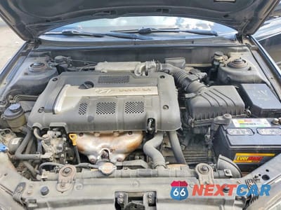 Zdjęcie 11 z 12 samochodu: 2006 HYUNDAI ELANTRA GLS VIN:KMHDN46D16U369001 - miniatura
