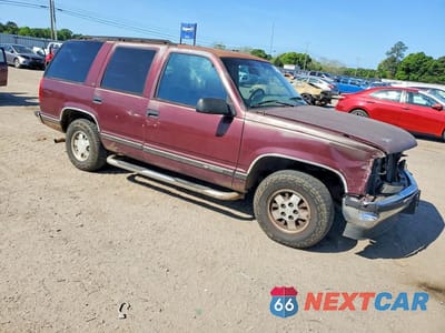 Czwarte zdjęcie samochodu z boku: 1995 CHEVROLET TAHOE C1500 VIN:1GNEC13K6SJ397881 - miniatura