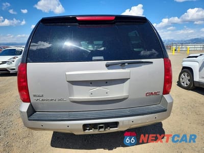 Zdjęcie 6 z 13 samochodu: 2007 GMC YUKON XL K1500 VIN:1GKFK16367J183697 - miniatura