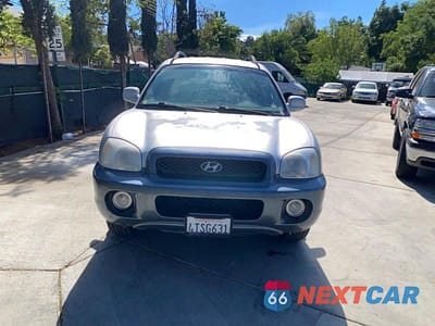 Zdjęcie 12 z 14 samochodu: 2001 HYUNDAI SANTA FE GL VIN:KM8SC83D01U126863 - miniatura
