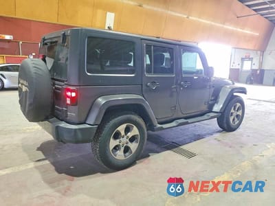 Trzecie zdjęcie samochodu z tyłu: 2017 JEEP WRANGLER UNLIMITED SAHARA VIN:1C4HJWEG0HL629809 - miniatura
