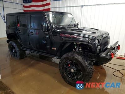 Czwarte zdjęcie samochodu z boku: 2013 JEEP WRANGLER UNLIMITED RUBICON VIN:1C4HJWFG5DL651684 - miniatura