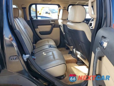 Zdjęcie 11 z 13 samochodu: 2006 HUMMER H3 VIN:5GTDN136868165984 - miniatura