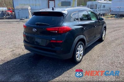 Czwarte zdjęcie samochodu z boku: 2019 HYUNDAI TUCSON VALUE VIN:KM8J3CA44KU045643 - miniatura