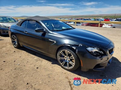 Czwarte zdjęcie samochodu z boku: 2017 BMW M6 VIN:WBS6G9C51HD932299 - miniatura