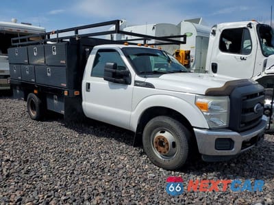 Czwarte zdjęcie samochodu z boku: 2014 FORD F350 SUPER DUTY VIN:1FDRF3G66EEB82231 - miniatura