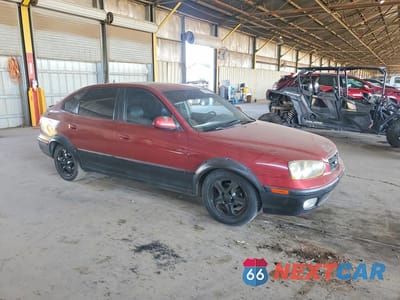 Czwarte zdjęcie samochodu z boku: 2003 HYUNDAI ELANTRA GT VIN:KMHDN55D63U089710 - miniatura