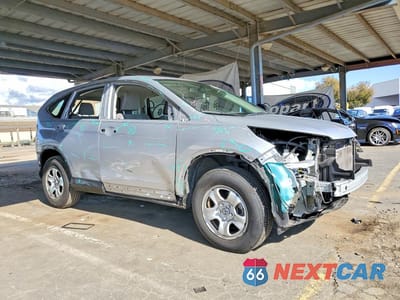 Czwarte zdjęcie samochodu z boku: 2014 HONDA CR-V LX VIN:2HKRM3H36EH556268 - miniatura