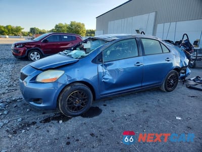 2011 TOYOTA YARIS BASE JTDBT4K33B1404700 - główne zdjęcie licytacji z USA - miniatura