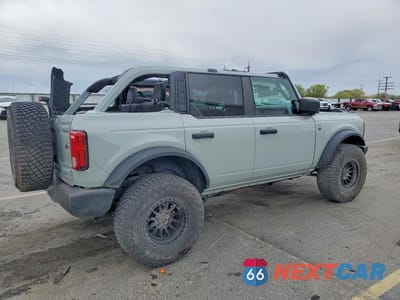 Trzecie zdjęcie samochodu z tyłu: 2023 FORD BRONCO BASE VIN:1FMDE5DH7PLB94577 - miniatura