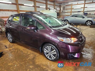Czwarte zdjęcie samochodu z boku: 2015 HONDA FIT EX VIN:3HGGK5H88FM747577 - miniatura