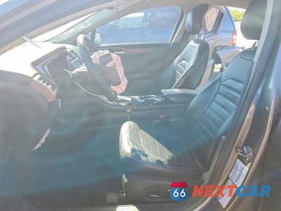 Zdjęcie 7 z 12 samochodu: 2013 FORD FUSION SE HYBRID VIN:3FA6P0LU5DR261009 - miniatura