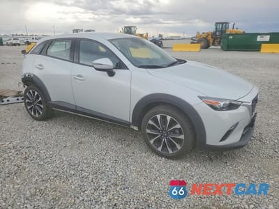 Czwarte zdjęcie samochodu z boku: 2019 MAZDA CX-3 TOURING VIN:JM1DKFC7XK1411037 - miniatura