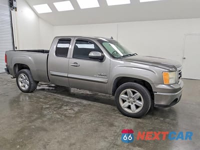Czwarte zdjęcie samochodu z boku: 2013 GMC SIERRA C1500 SLE VIN:1GTR1VE08DZ184518 - miniatura