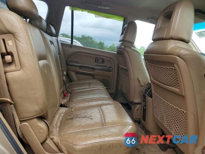 Zdjęcie 11 z 14 samochodu: 2004 HONDA PILOT VIN:2HKYF18674H512086 - miniatura