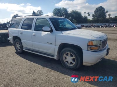 Czwarte zdjęcie samochodu z boku: 2004 GMC YUKON DENALI VIN:1GKEK63U34J177891 - miniatura