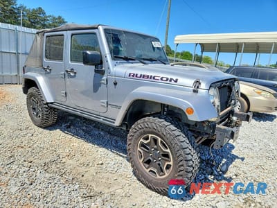 Czwarte zdjęcie samochodu z boku: 2015 JEEP WRANGLER UNLIMITED RUBICON VIN:1C4BJWFG6FL634949 - miniatura