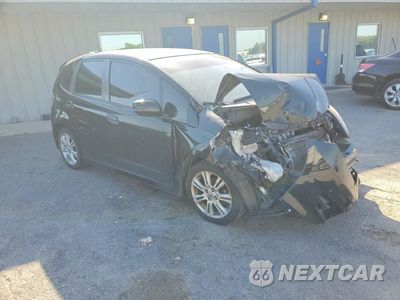 Czwarte zdjęcie samochodu z boku: 2010 HONDA FIT SPORT VIN:JHMGE8H40AS016922 - miniatura