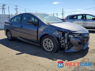 Czwarte zdjęcie samochodu z boku: 2022 TOYOTA PRIUS PRIME LE VIN:JTDKAMFP2N3201194 - miniatura