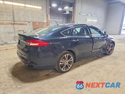 Trzecie zdjęcie samochodu z tyłu: 2017 FORD FUSION TITANIUM VIN:3FA6P0D97HR184093 - miniatura