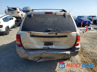 Zdjęcie 6 z 13 samochodu: 2000 JEEP GRAND CHEROKEE LAREDO VIN:1J4GW48S0YC388328 - miniatura