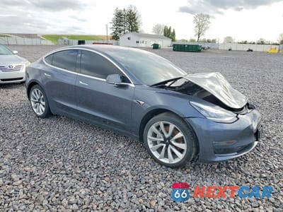 Czwarte zdjęcie samochodu z boku: 2018 TESLA MODEL 3 VIN:5YJ3E1EAXJF023925 - miniatura