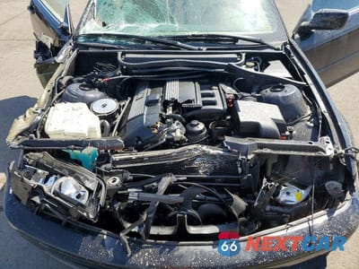 Zdjęcie 11 z 13 samochodu: 2000 BMW 323 CI VIN:WBABR3344YEB39089 - miniatura