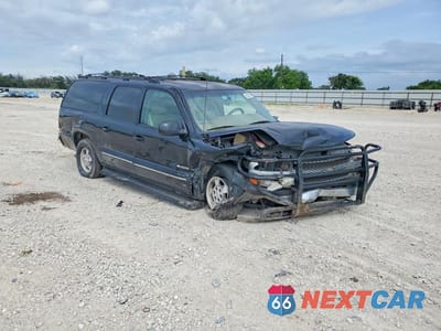 Czwarte zdjęcie samochodu z boku: 2000 CHEVROLET SUBURBAN C1500 VIN:3GNEC16T0YG145395 - miniatura