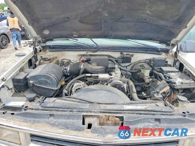 Zdjęcie 12 z 13 samochodu: 1999 CHEVROLET SUBURBAN K1500 VIN:1GNFK16R2XJ440152 - miniatura