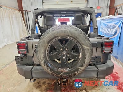 Zdjęcie 6 z 12 samochodu: 2016 JEEP WRANGLER UNLIMITED SPORT VIN:1C4BJWDG1GL266118 - miniatura